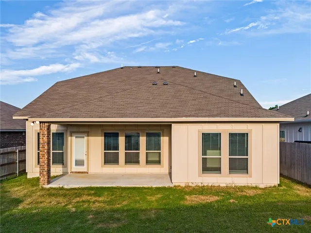 front view of house with a yard