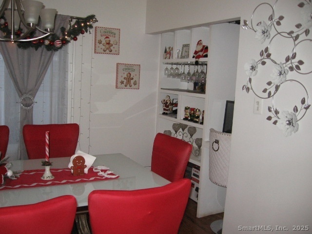 105 Edin Avenue Waterbury, CT 06706 - Photo 14 of 27 a living room with furniture a rug and a table
