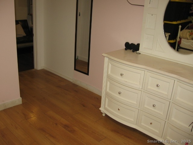 105 Edin Avenue Waterbury, CT 06706 - Photo 27 of 27 a view of a closet with wooden floor
