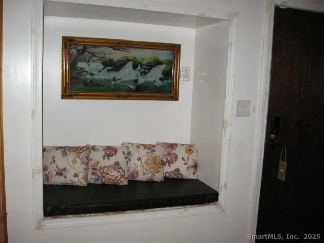 a view of a couch sitting in a kitchen