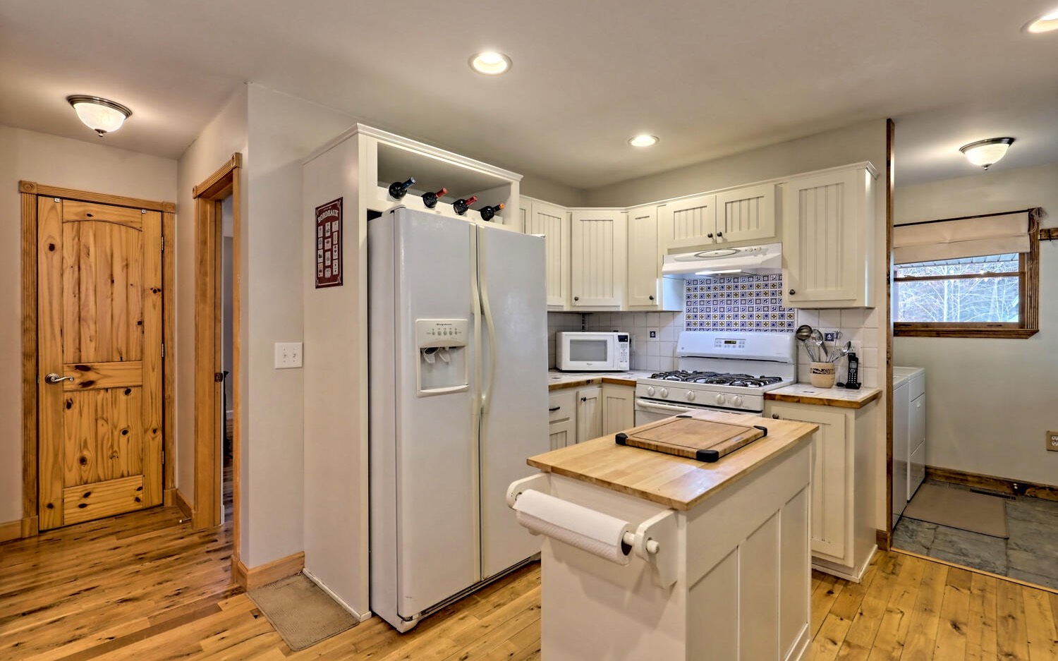 2289 Hedden Road Murphy, NC 28906 - Photo 15 of 50 a kitchen with a appliances a sink and a refrigerator