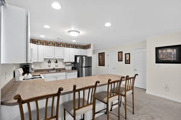 a view of a dining room with furniture