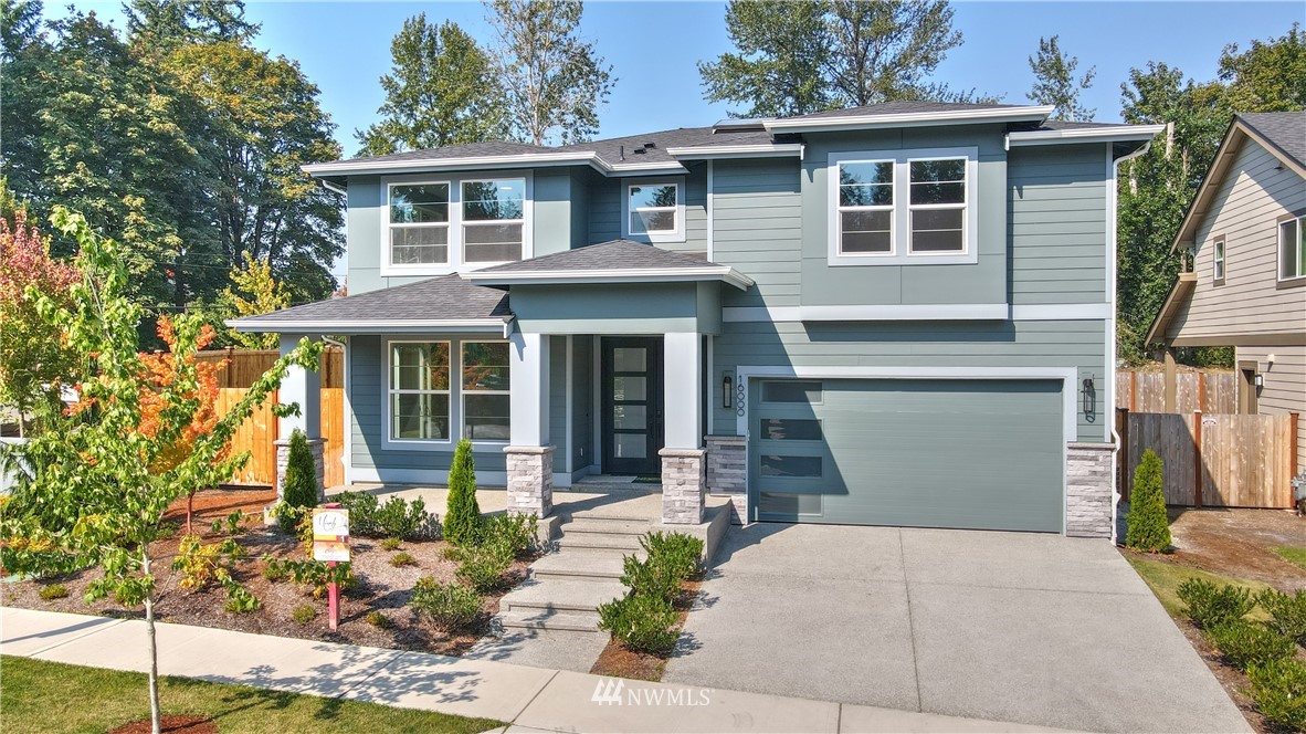 16000 Southeast 140th Street Renton, WA 98059 - Photo 1 of 1 a front view of a house with a yard