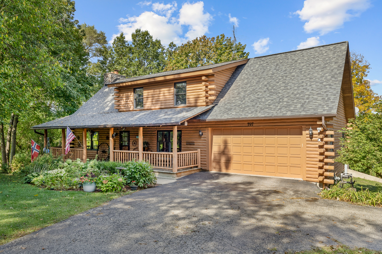 front view of a house with a garden