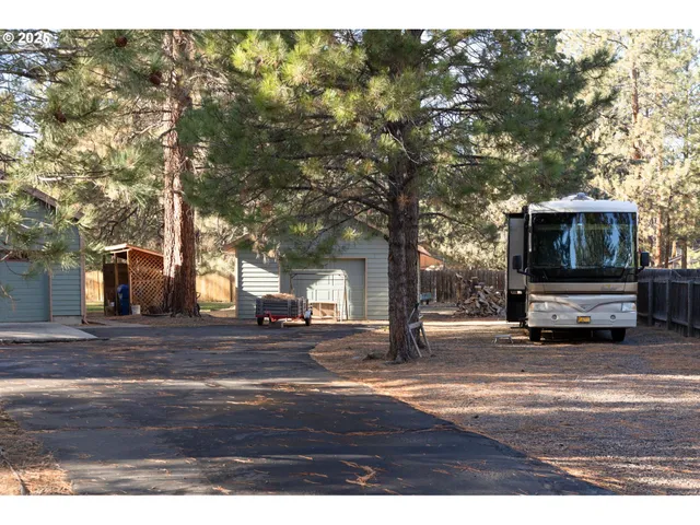 a view of outdoor space with deck and hardwood floor