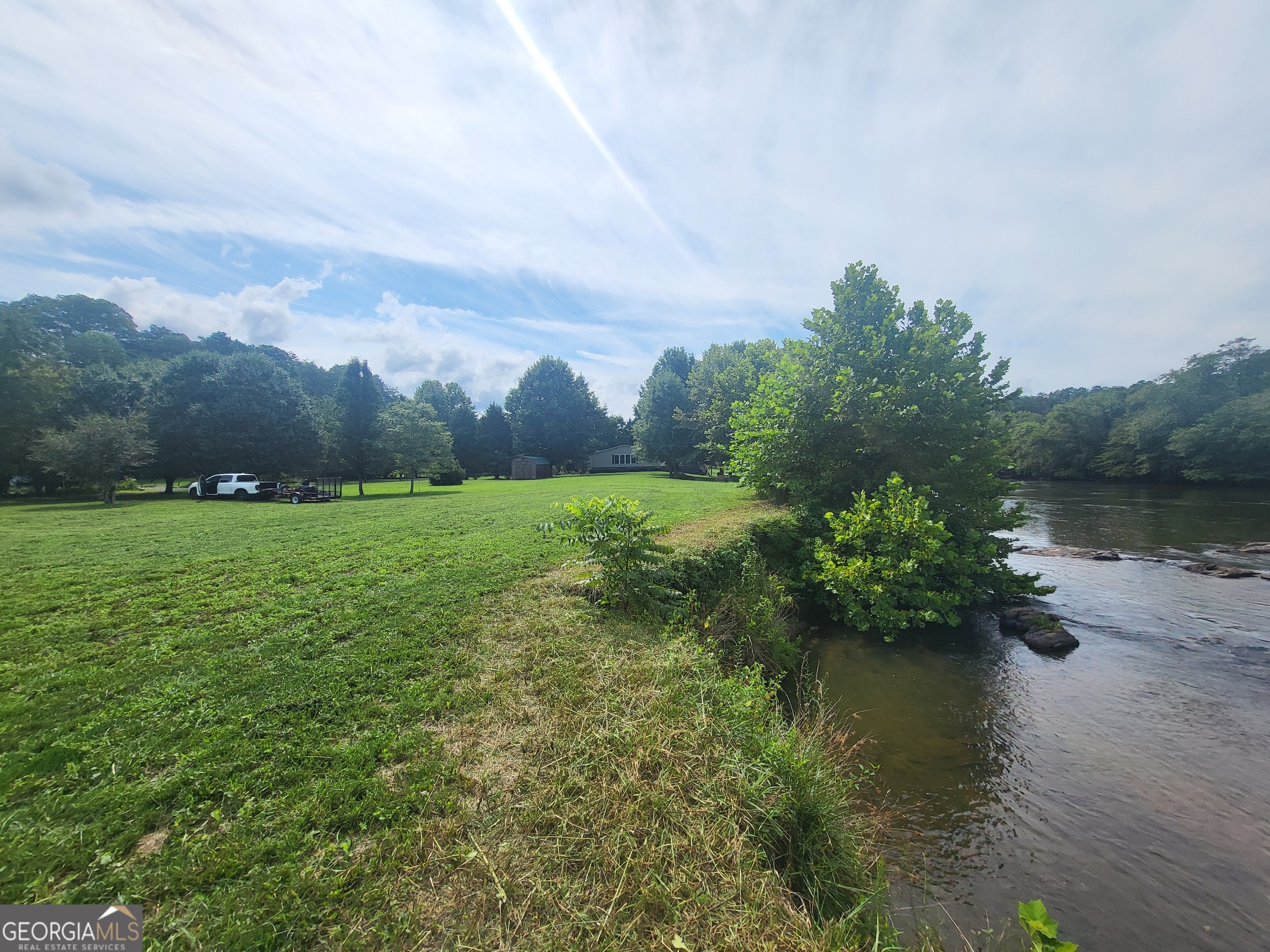 43 Moon Shadow Road Franklin, NC 28734 - Photo 10 of 12 a view of a lake with a city