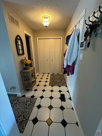 $210,000 | 98 Southwest Pepper Tree Lane, Topeka, KS 66611