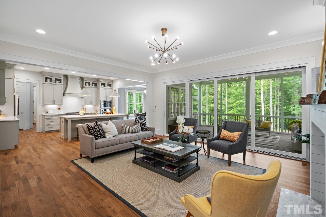 7204 Sing Along Court Raleigh, NC 27613 - Photo 14 of 46 a living room with furniture and a large window
