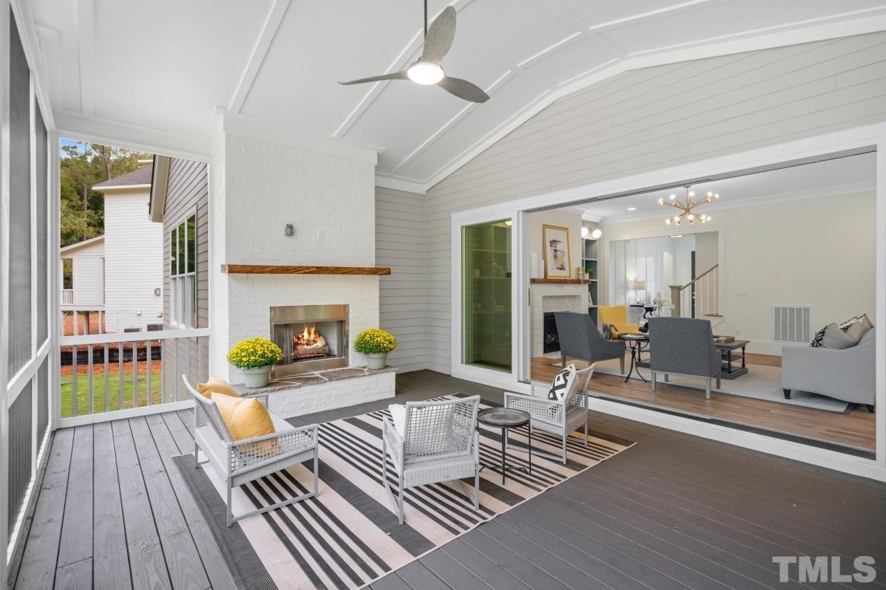 7204 Sing Along Court Raleigh, NC 27613 - Photo 23 of 46 a living room with furniture and a fireplace