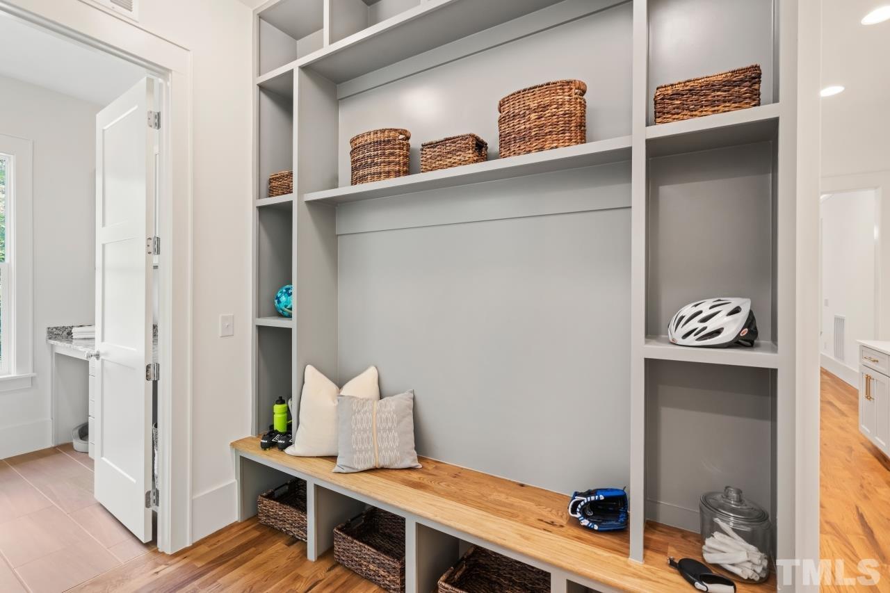 7204 Sing Along Court Raleigh, NC 27613 - Photo 31 of 46 a view of dining room and wooden floor