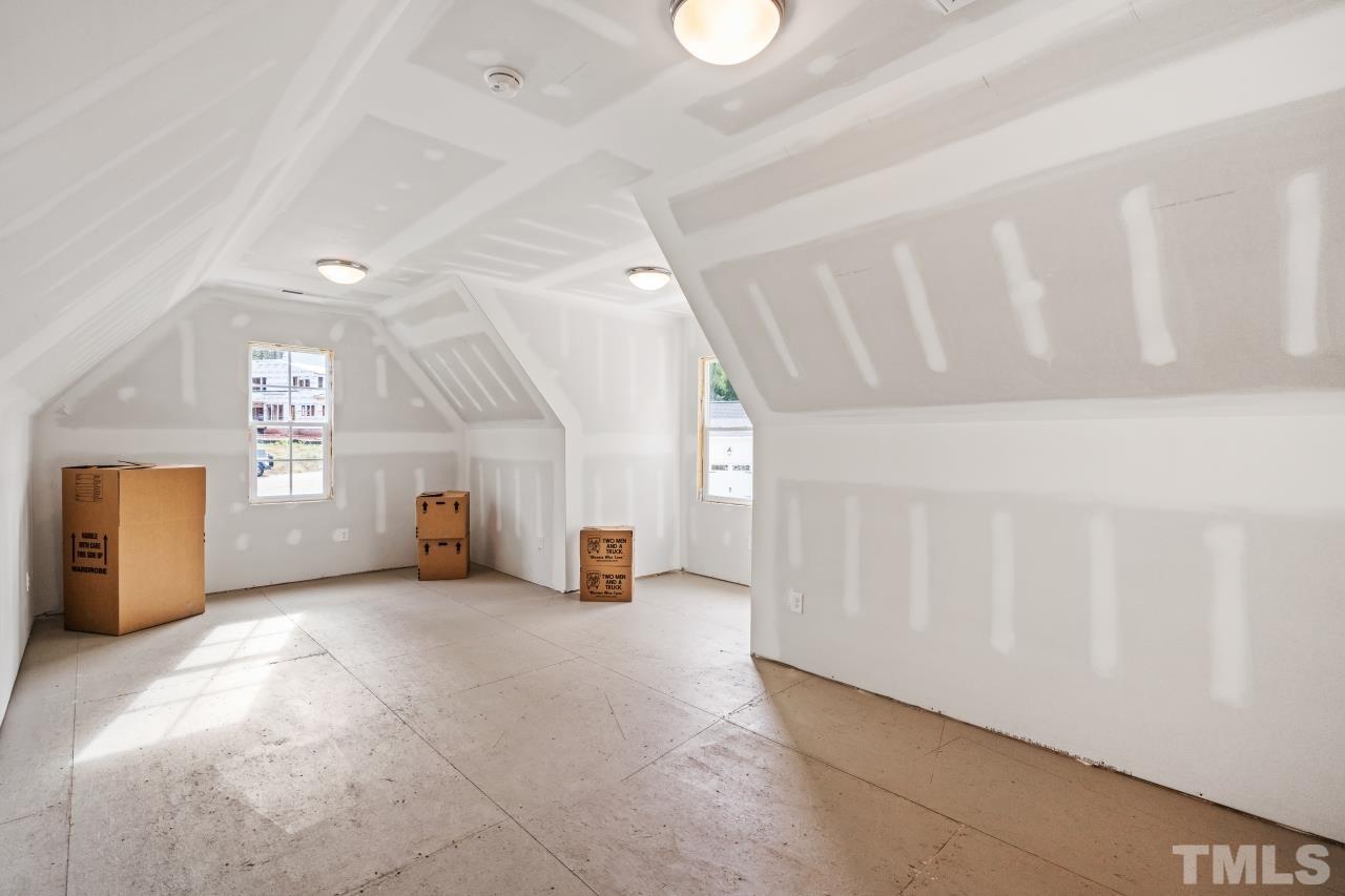 7204 Sing Along Court Raleigh, NC 27613 - Photo 45 of 46 a view of a livingroom with a fireplace