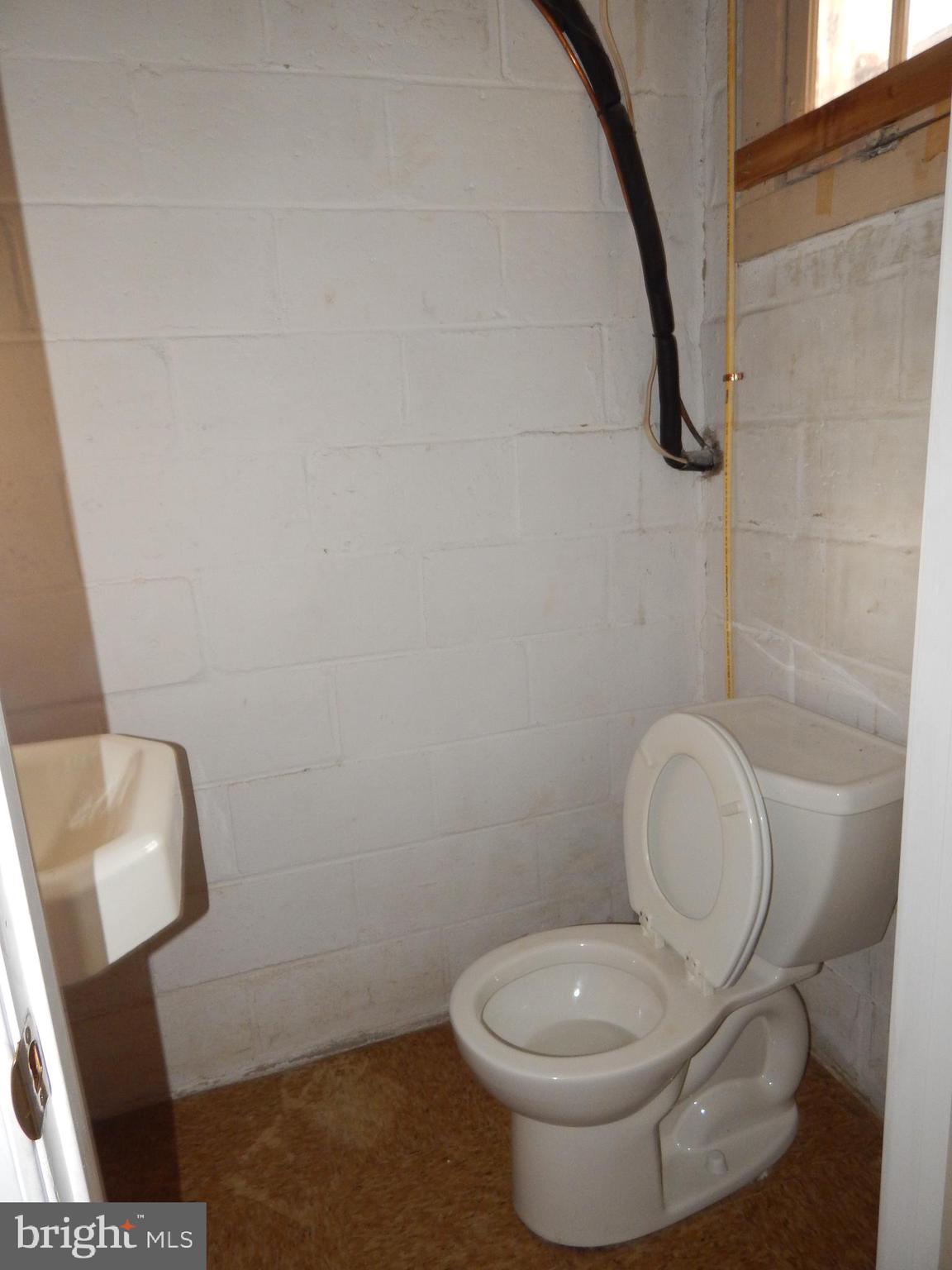 105 Regester Avenue Baltimore, MD 21212 - Photo 26 of 28 Basement Half Bath
