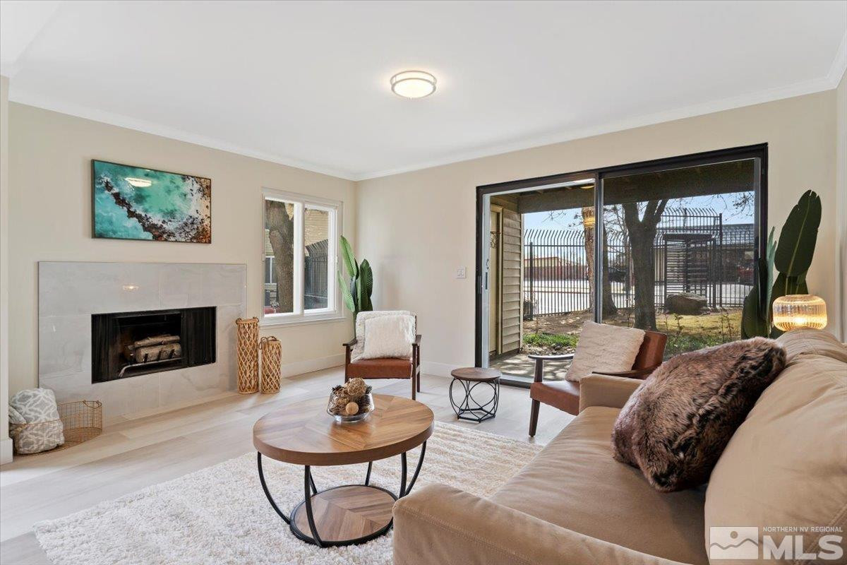 2380 Roundhouse Road Sparks, NV 89431 - Photo 2 of 22 a living room with furniture and a fireplace