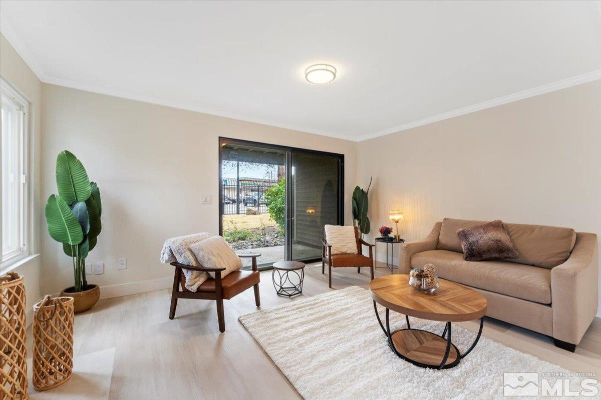 2380 Roundhouse Road Sparks, NV 89431 - Photo 10 of 22 a living room with furniture and a wooden floor