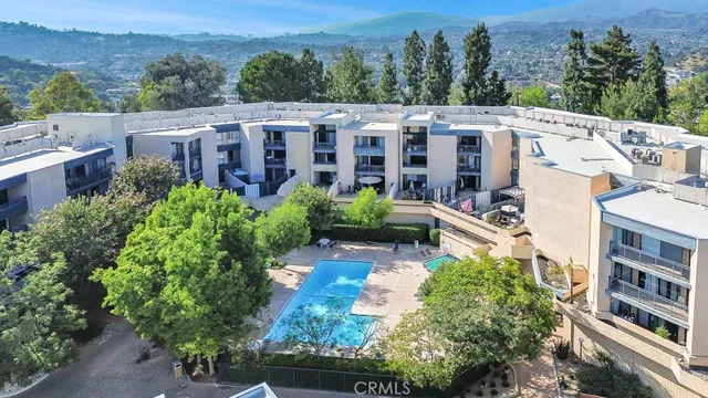 a view of a city with tall buildings