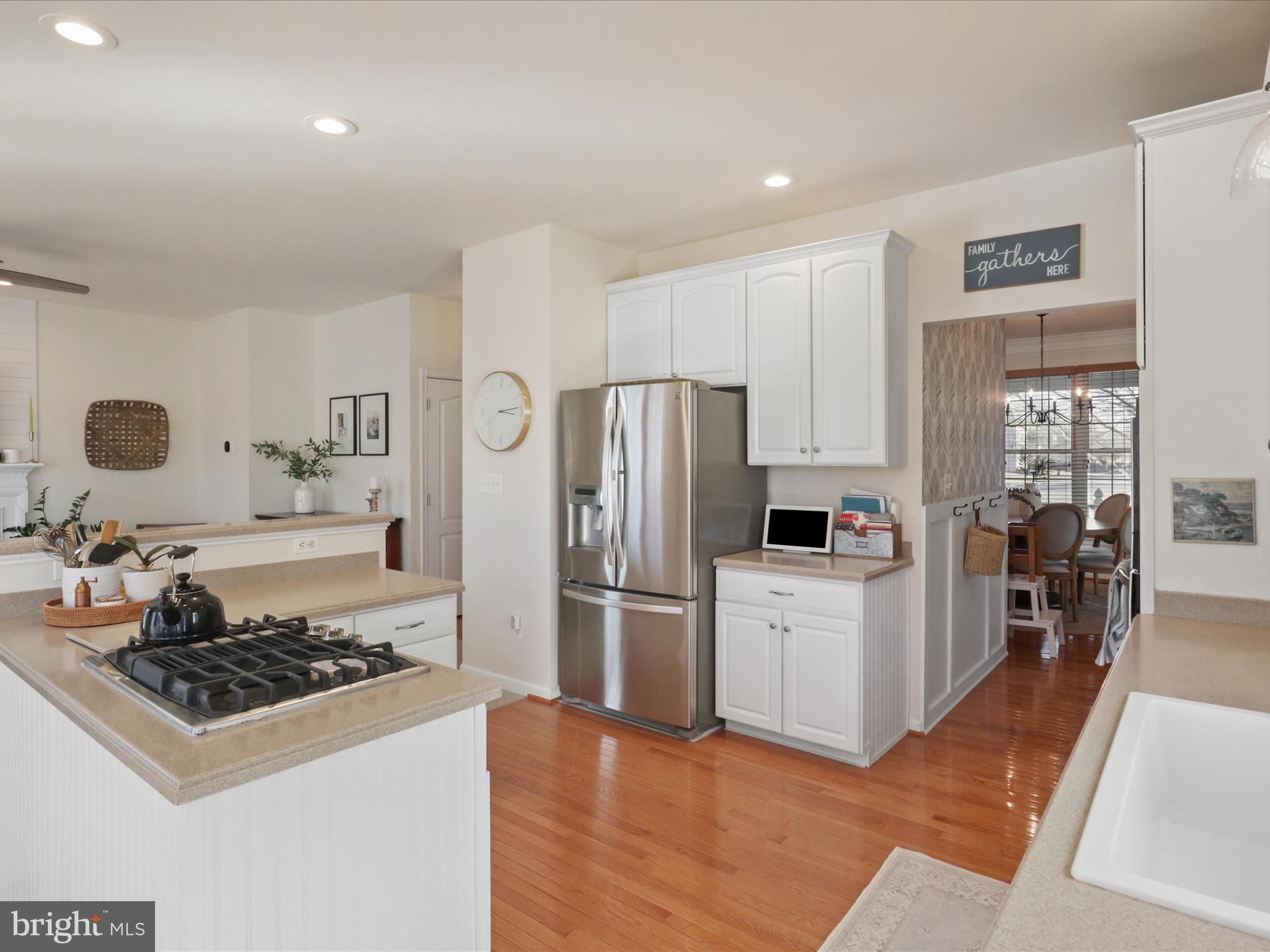 43081 Edgewater Street Chantilly, VA 20152 - Photo 20 of 50 a kitchen with a stove a refrigerator and a sink