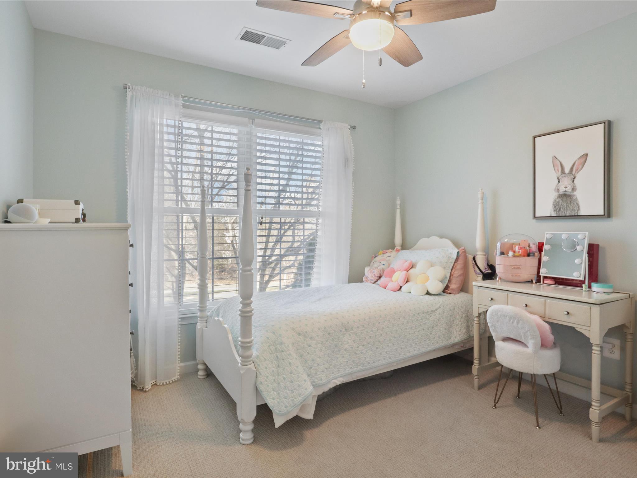 43081 Edgewater Street Chantilly, VA 20152 - Photo 23 of 50 a bedroom with a bed and a chandelier