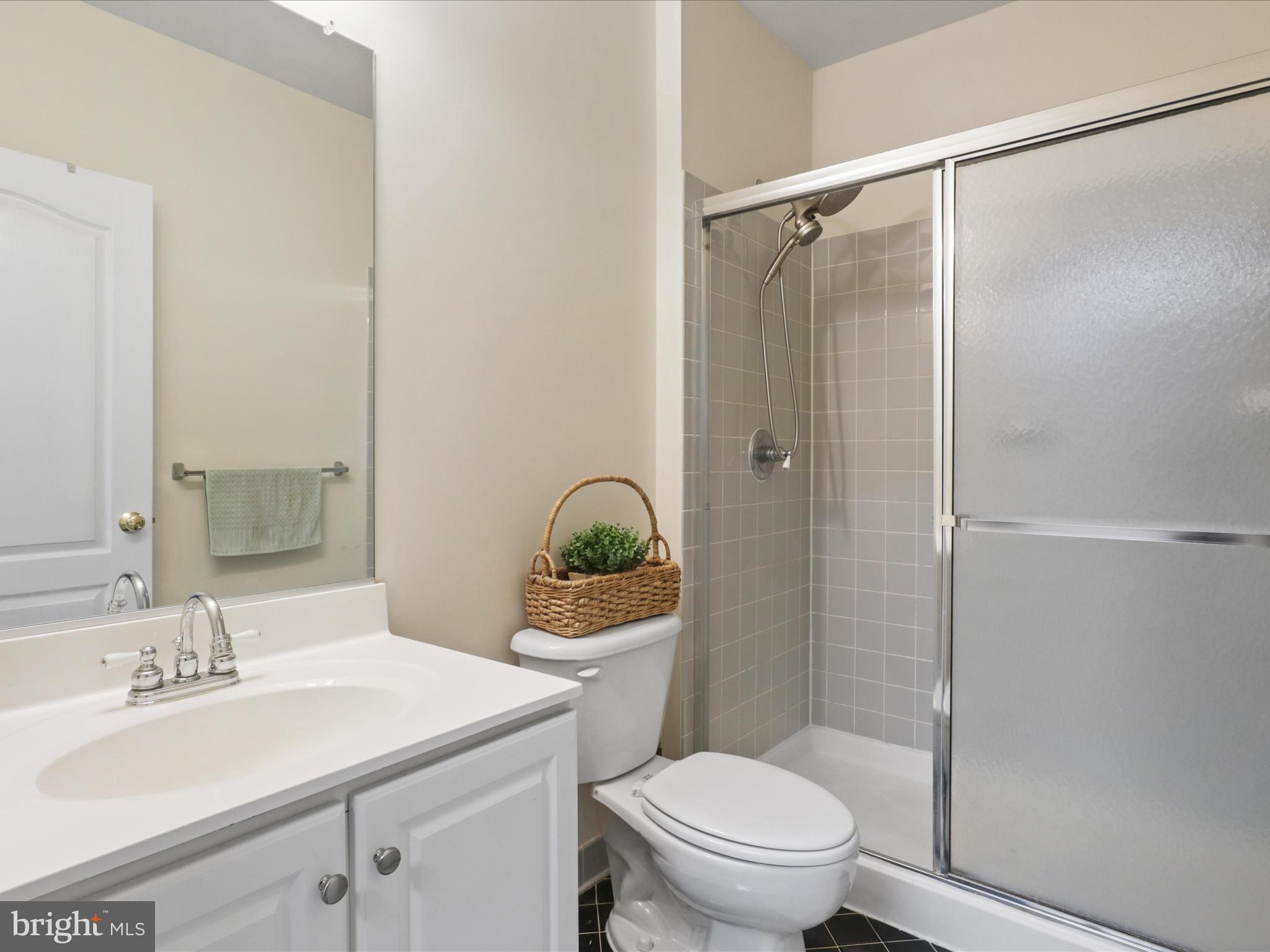 43081 Edgewater Street Chantilly, VA 20152 - Photo 24 of 50 a bathroom with a sink toilet and shower