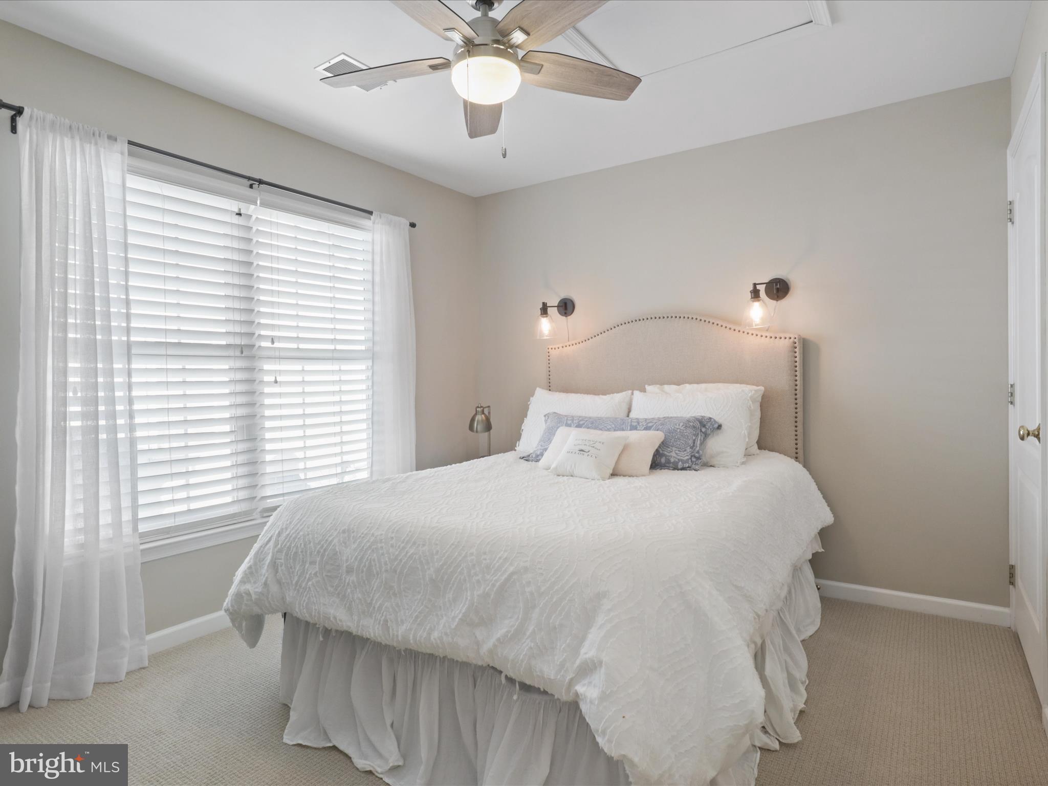 43081 Edgewater Street Chantilly, VA 20152 - Photo 25 of 50 a bedroom with a bed and window