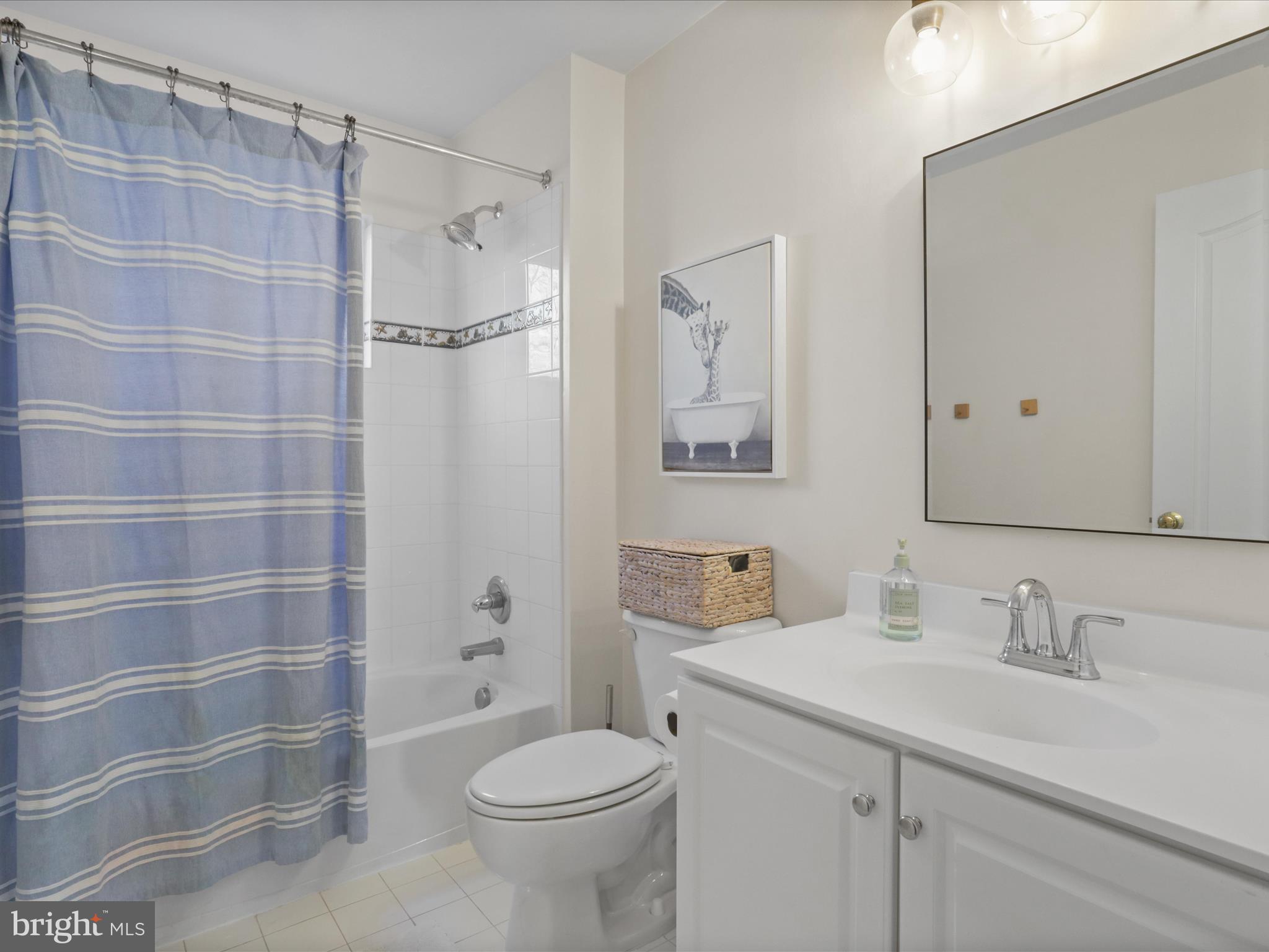 43081 Edgewater Street Chantilly, VA 20152 - Photo 34 of 50 a bathroom with a sink toilet and shower
