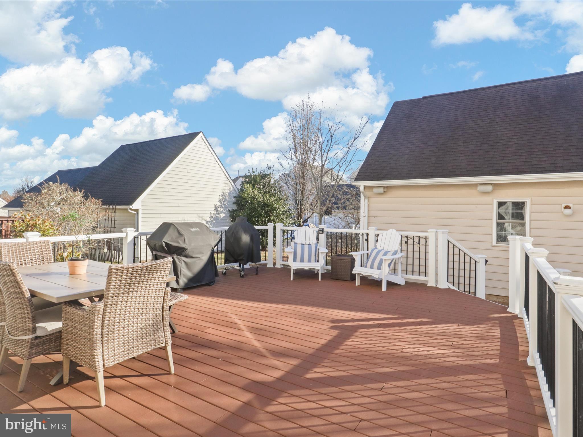 43081 Edgewater Street Chantilly, VA 20152 - Photo 36 of 50 a view of a terrace with seating space