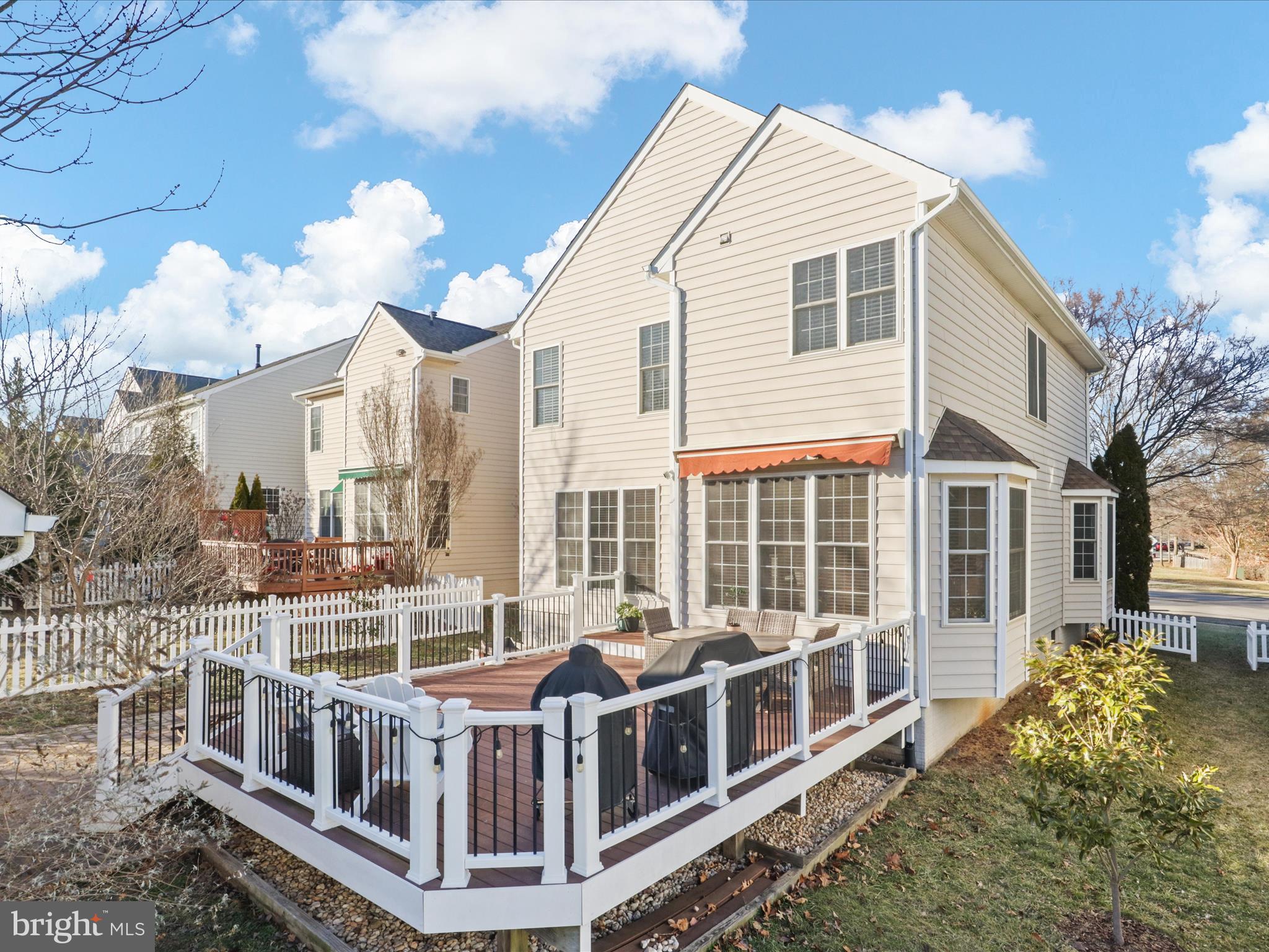 43081 Edgewater Street Chantilly, VA 20152 - Photo 39 of 50 a view of a house with a yard