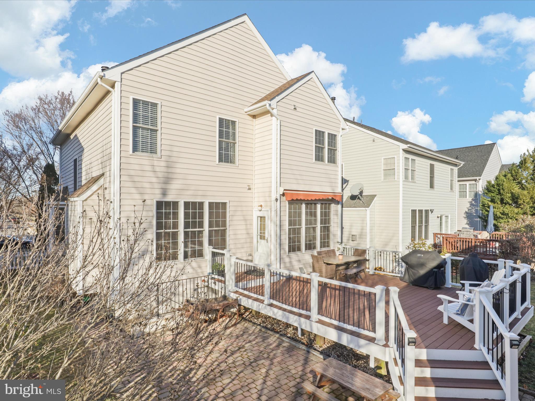 43081 Edgewater Street Chantilly, VA 20152 - Photo 40 of 50 a view of a house with backyard and sitting area