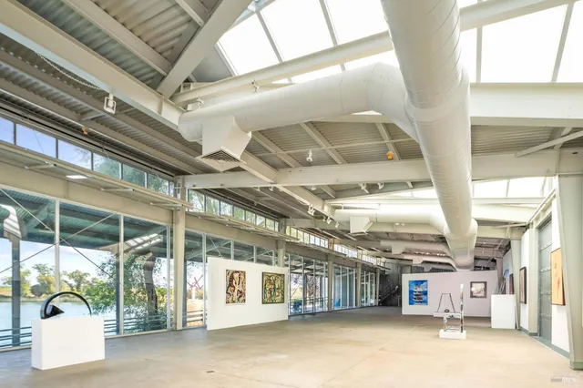 a view of a room with wooden walls