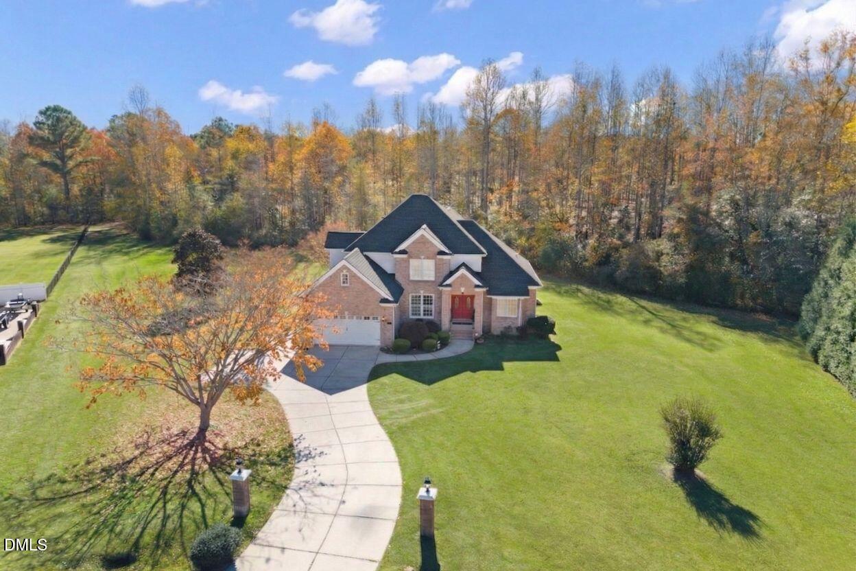226 Marshview Circle Angier, NC 27501 - Photo 14 of 20 a view of a house with a yard