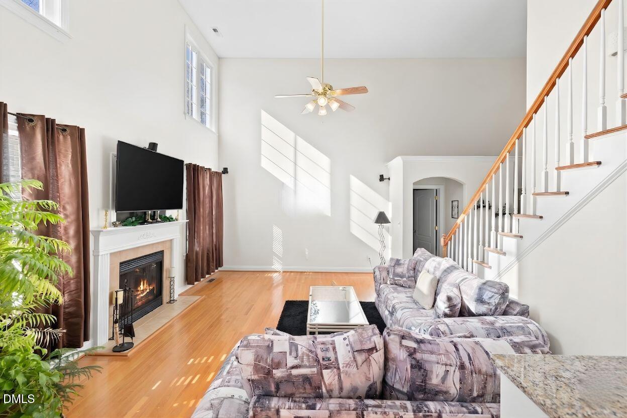 226 Marshview Circle Angier, NC 27501 - Photo 2 of 20 a living room with fireplace furniture and a flat screen tv