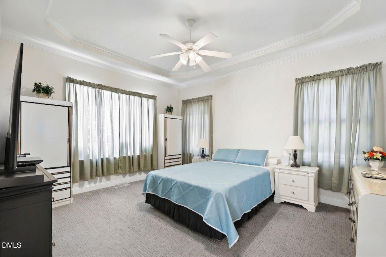 226 Marshview Circle Angier, NC 27501 - Photo 7 of 20 a spacious bedroom with a bed and a window