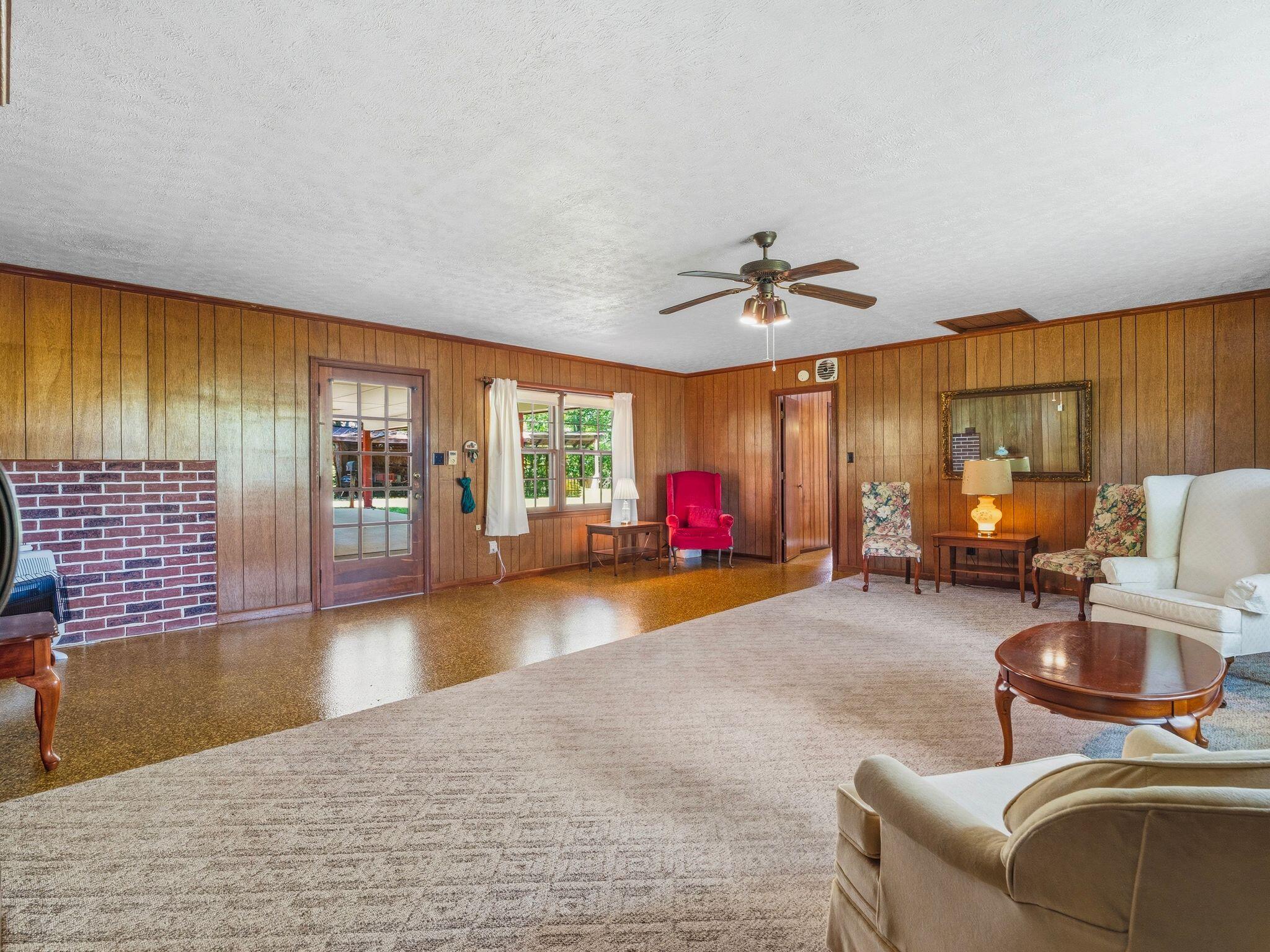 1115 Robin Ridge Road Henry, VA 24102 - Photo 18 of 54 a living room with furniture and a wooden floor