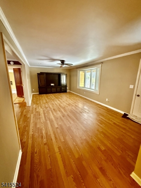 150 Karrville Road Port Murray, NJ 07865 - Photo 7 of 40 a view of empty room with wooden floor and fan