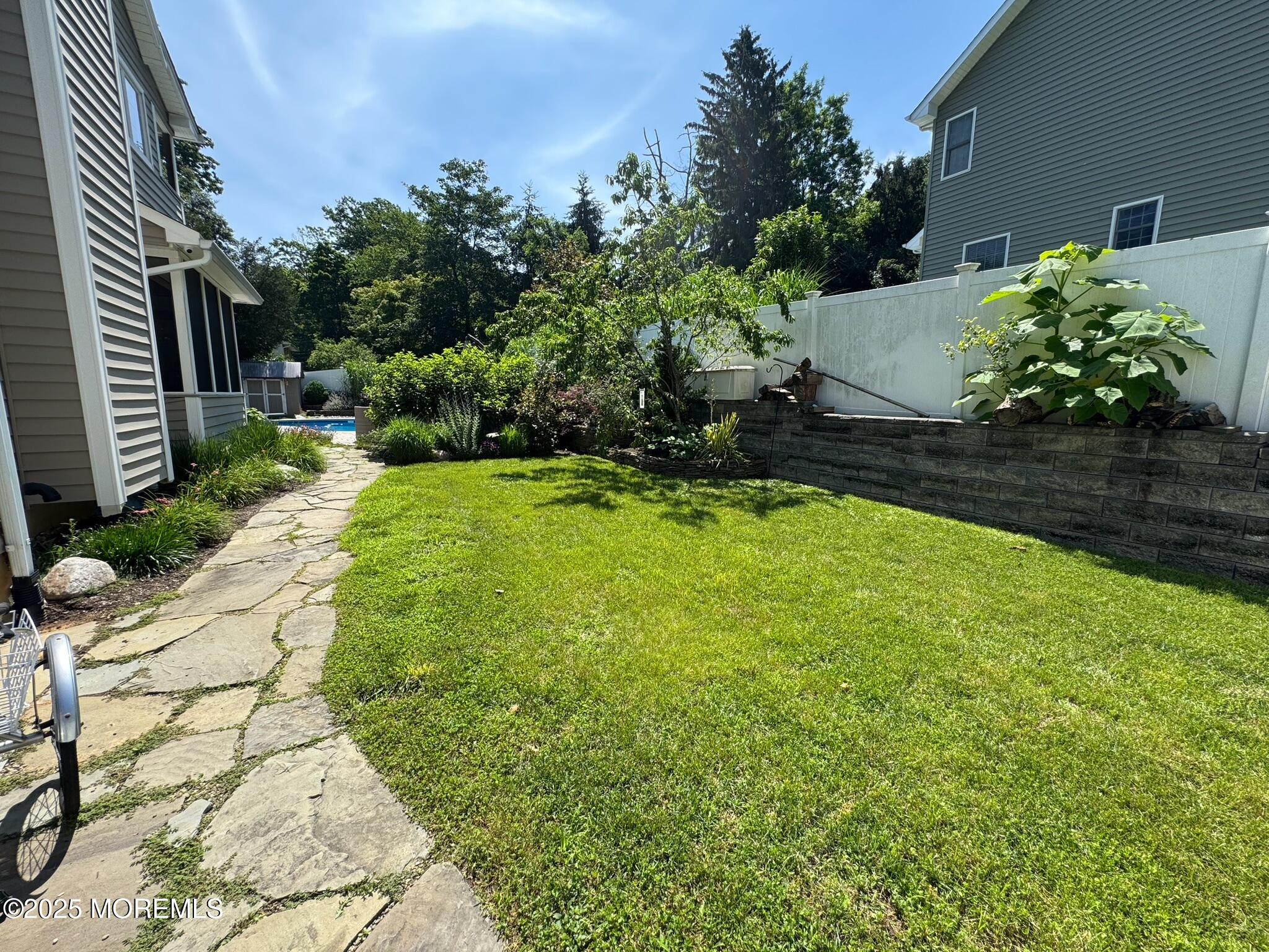 244 Van Kirk Avenue Atlantic Highlands, NJ 07716 - Photo 16 of 22 a view of a garden with plants