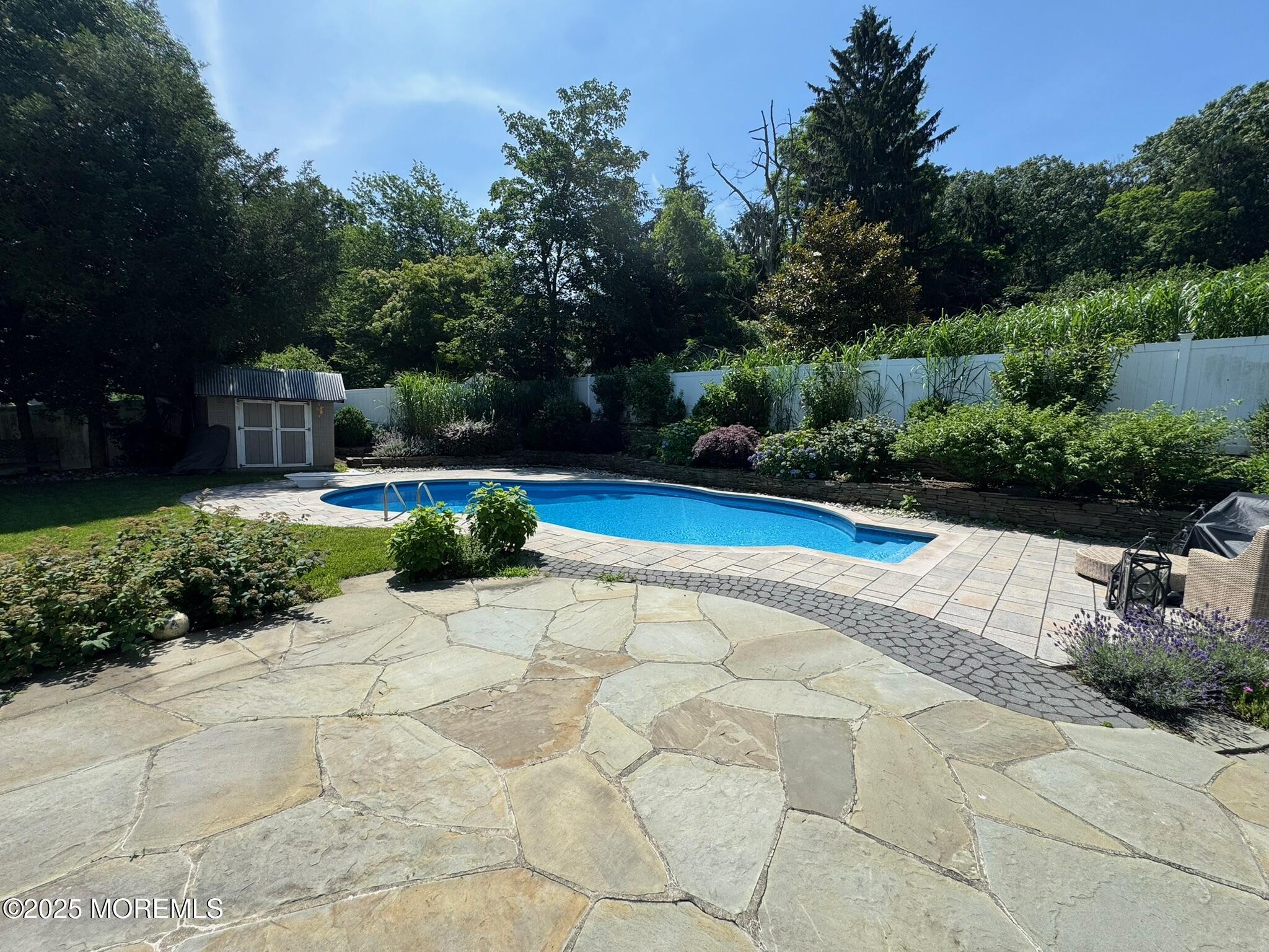 244 Van Kirk Avenue Atlantic Highlands, NJ 07716 - Photo 18 of 22 a view of backyard with swimming pool and green space