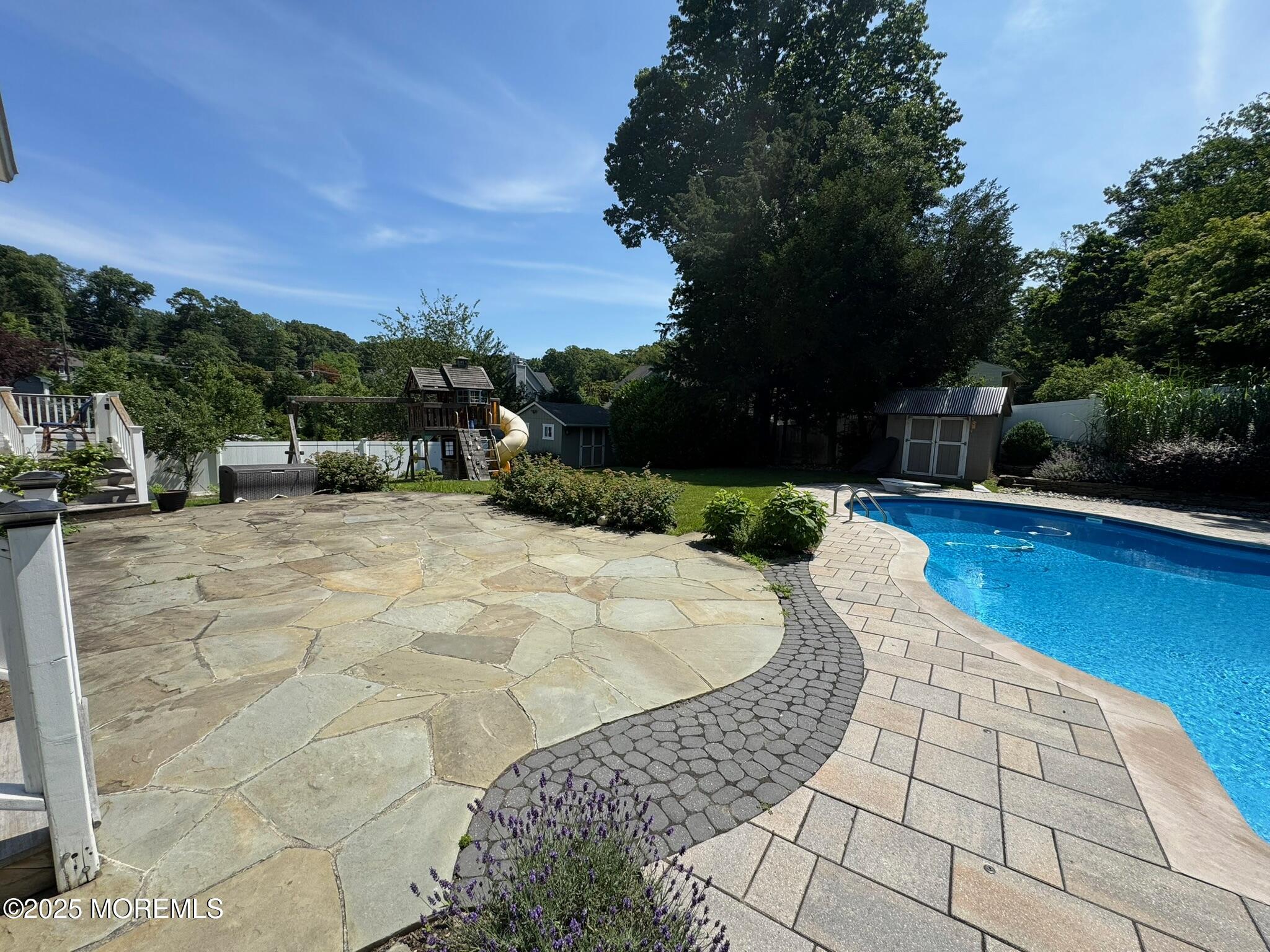 244 Van Kirk Avenue Atlantic Highlands, NJ 07716 - Photo 19 of 22 a view of a swimming pool with a patio