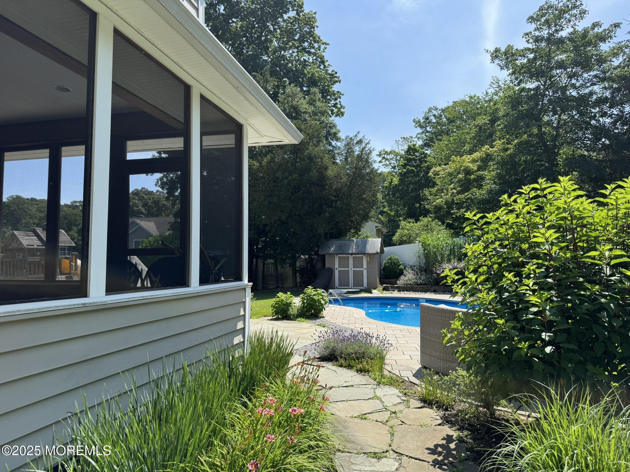 244 Van Kirk Avenue Atlantic Highlands, NJ 07716 - Photo 21 of 22 a view of a house with porch and garden