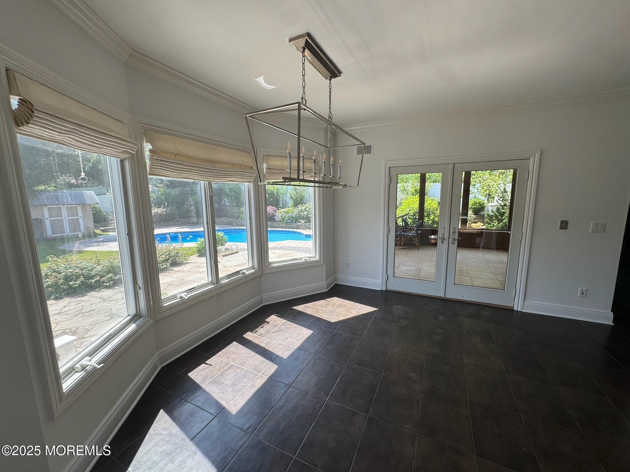 244 Van Kirk Avenue Atlantic Highlands, NJ 07716 - Photo 3 of 22 a view of an empty room with glass door and windows