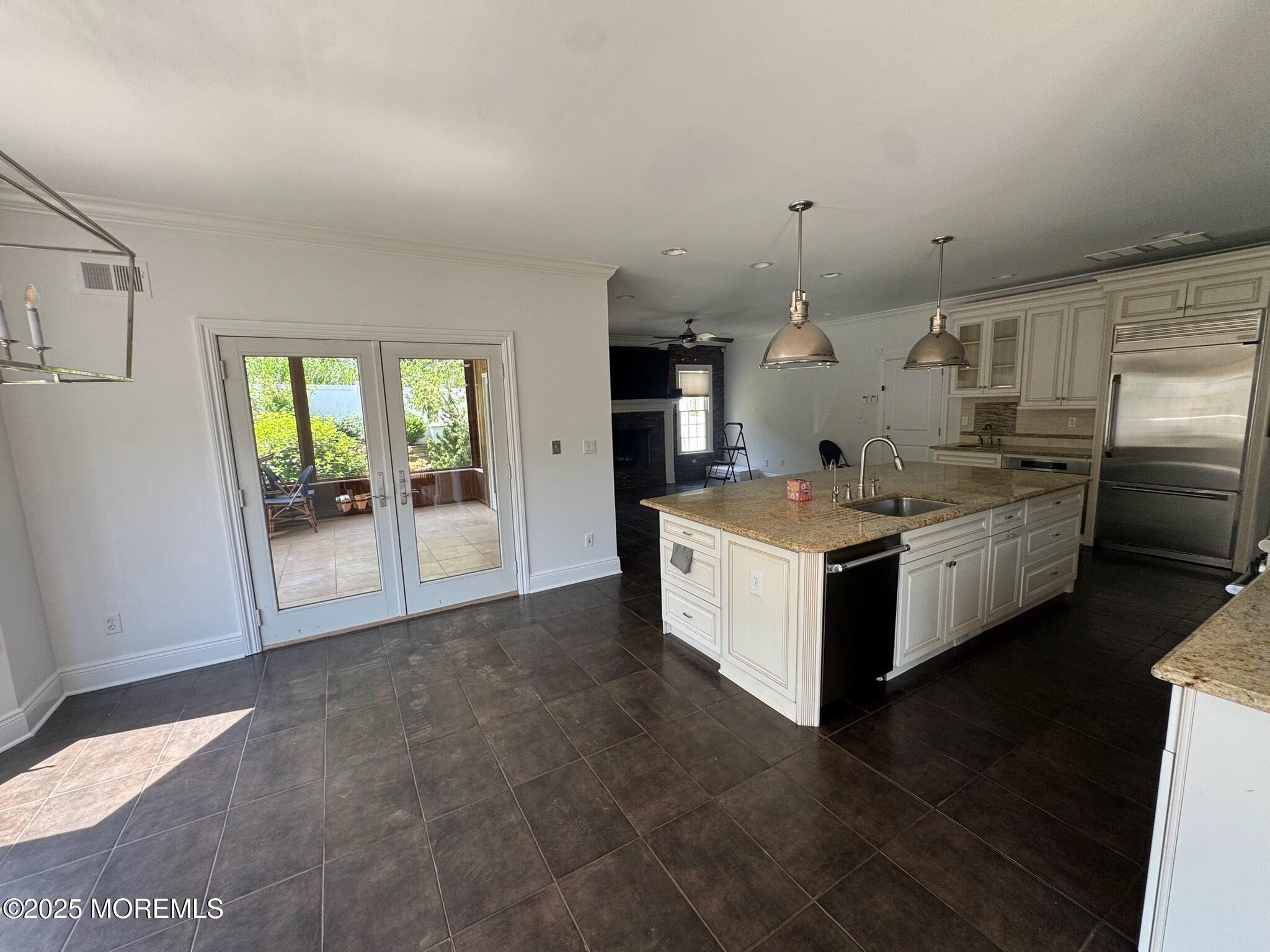 244 Van Kirk Avenue Atlantic Highlands, NJ 07716 - Photo 4 of 22 a large white kitchen with a large window