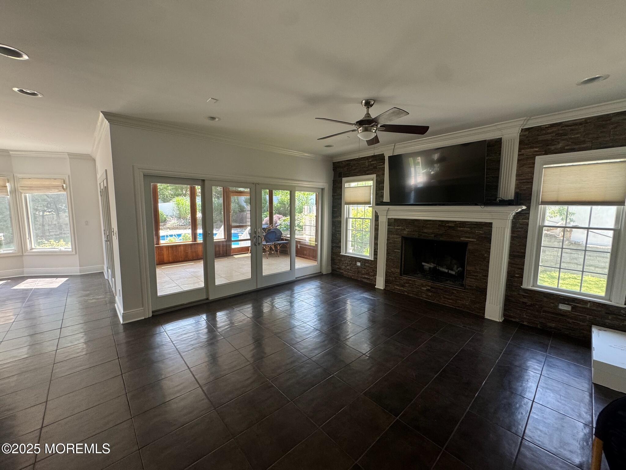 244 Van Kirk Avenue Atlantic Highlands, NJ 07716 - Photo 8 of 22 a view of empty room with fireplace and wooden floor