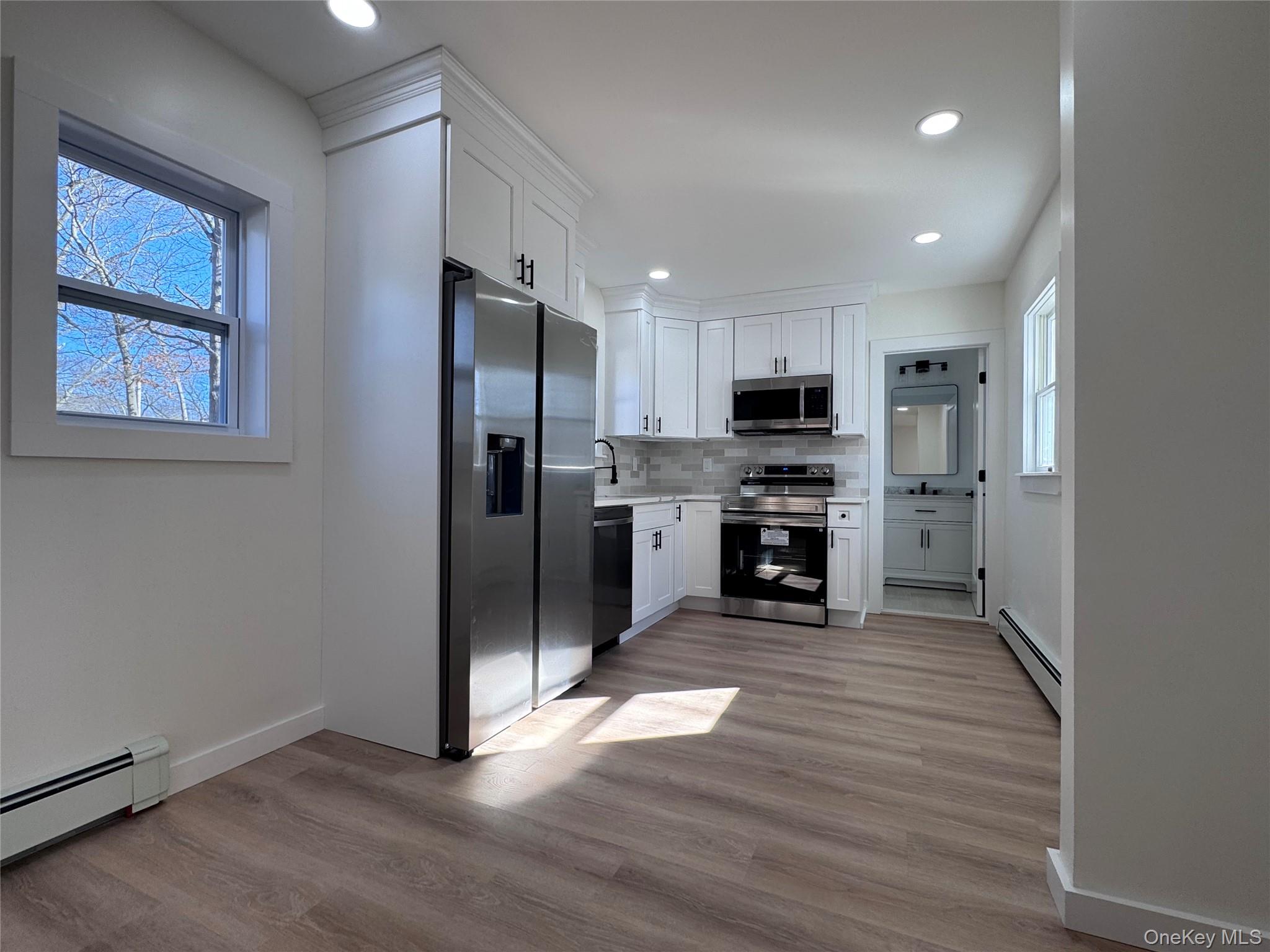 277 Prince Road Rocky Point, NY 11778 - Photo 7 of 13 Kitchen & Dining Area.