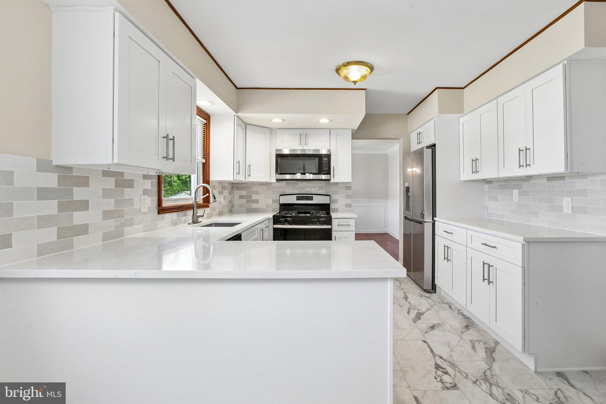 56 Whitehall Road Hamilton, NJ 08690 - Photo 12 of 37 Modern kitchen with sleek finishes.