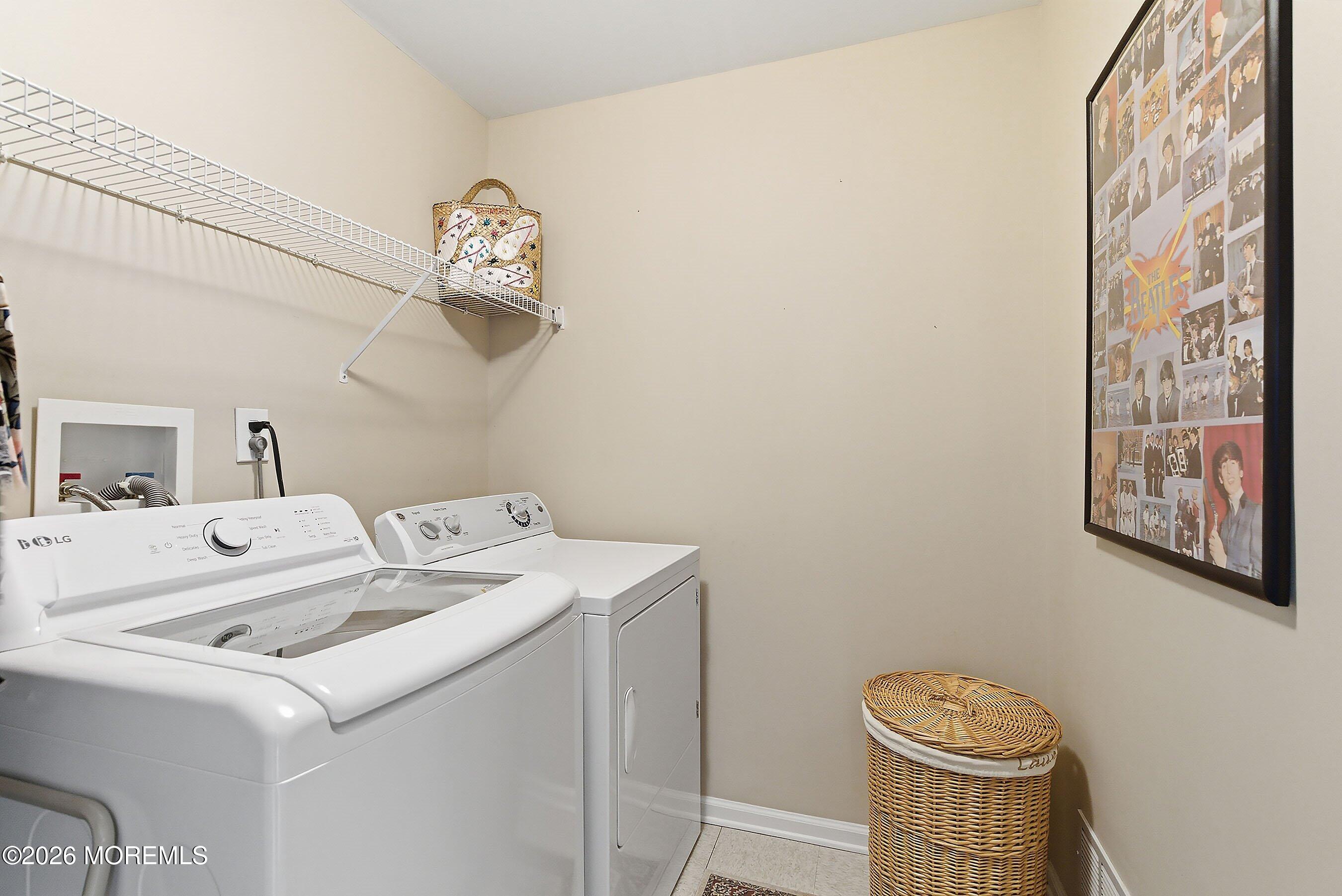 2409 Robin Way Manasquan, NJ 08736 - Photo 22 of 40 a utility room with dryer and washer