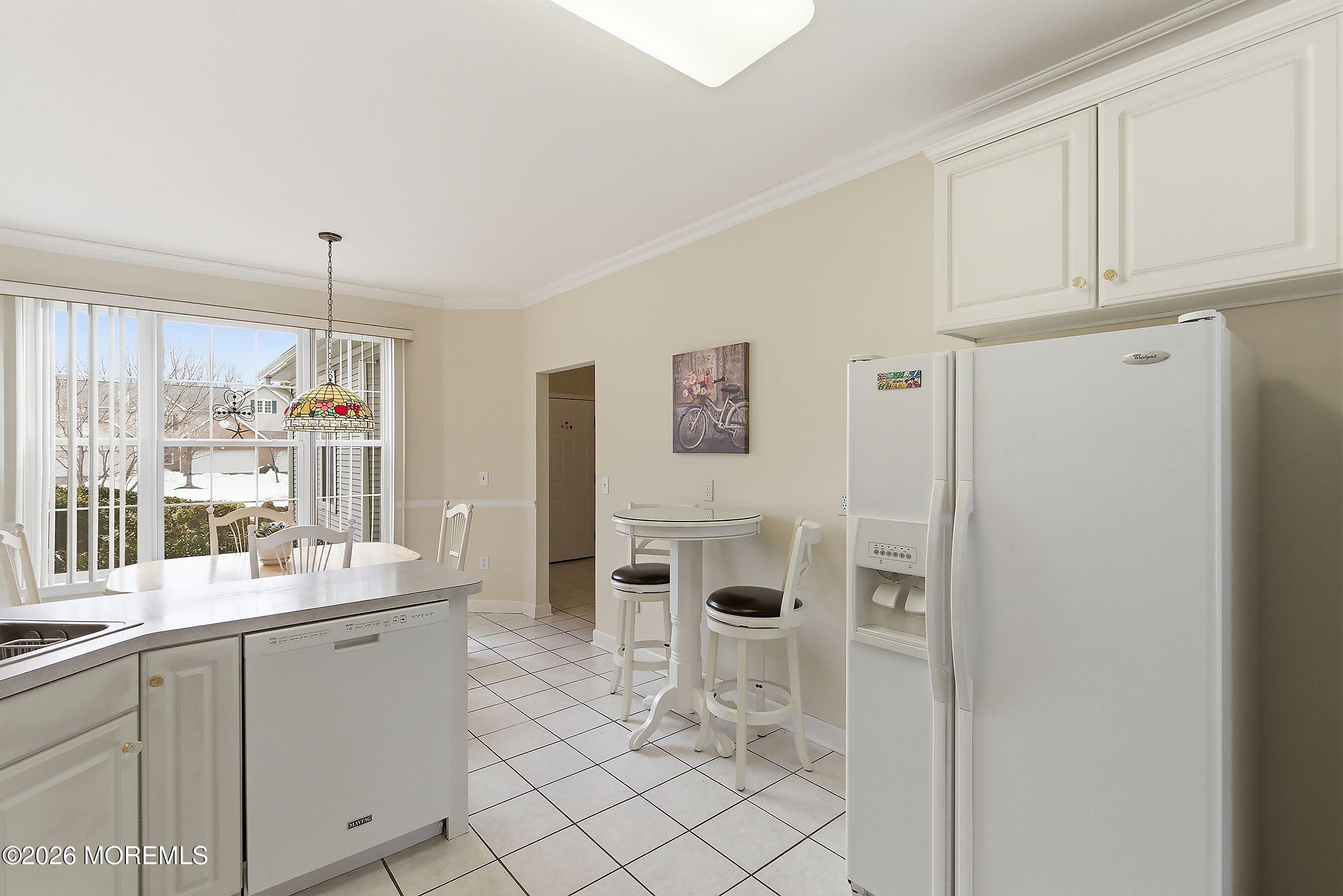 2409 Robin Way Manasquan, NJ 08736 - Photo 5 of 40 a room with white cabinets and window