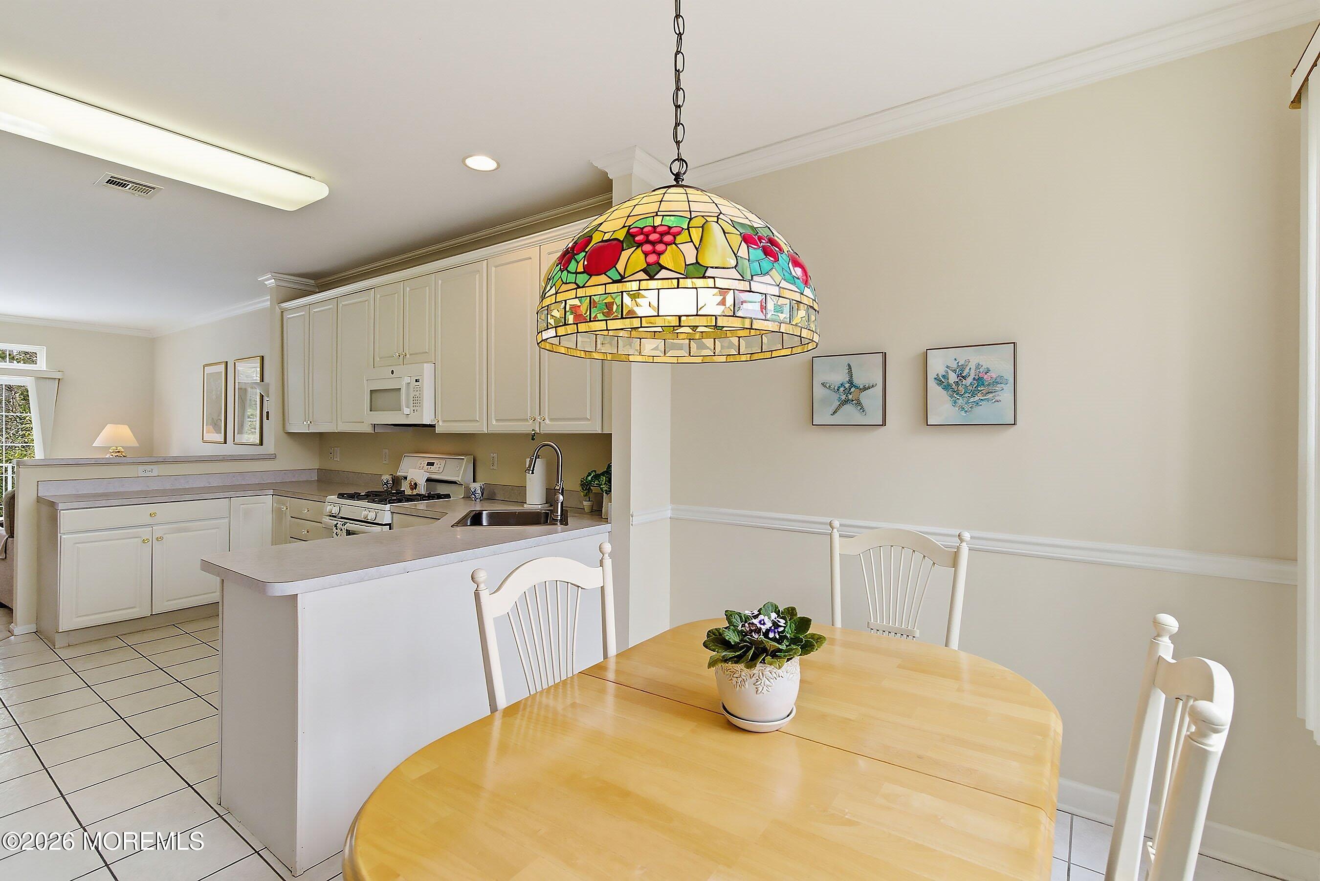 2409 Robin Way Manasquan, NJ 08736 - Photo 7 of 40 a very nice looking dining room with a table and chairs