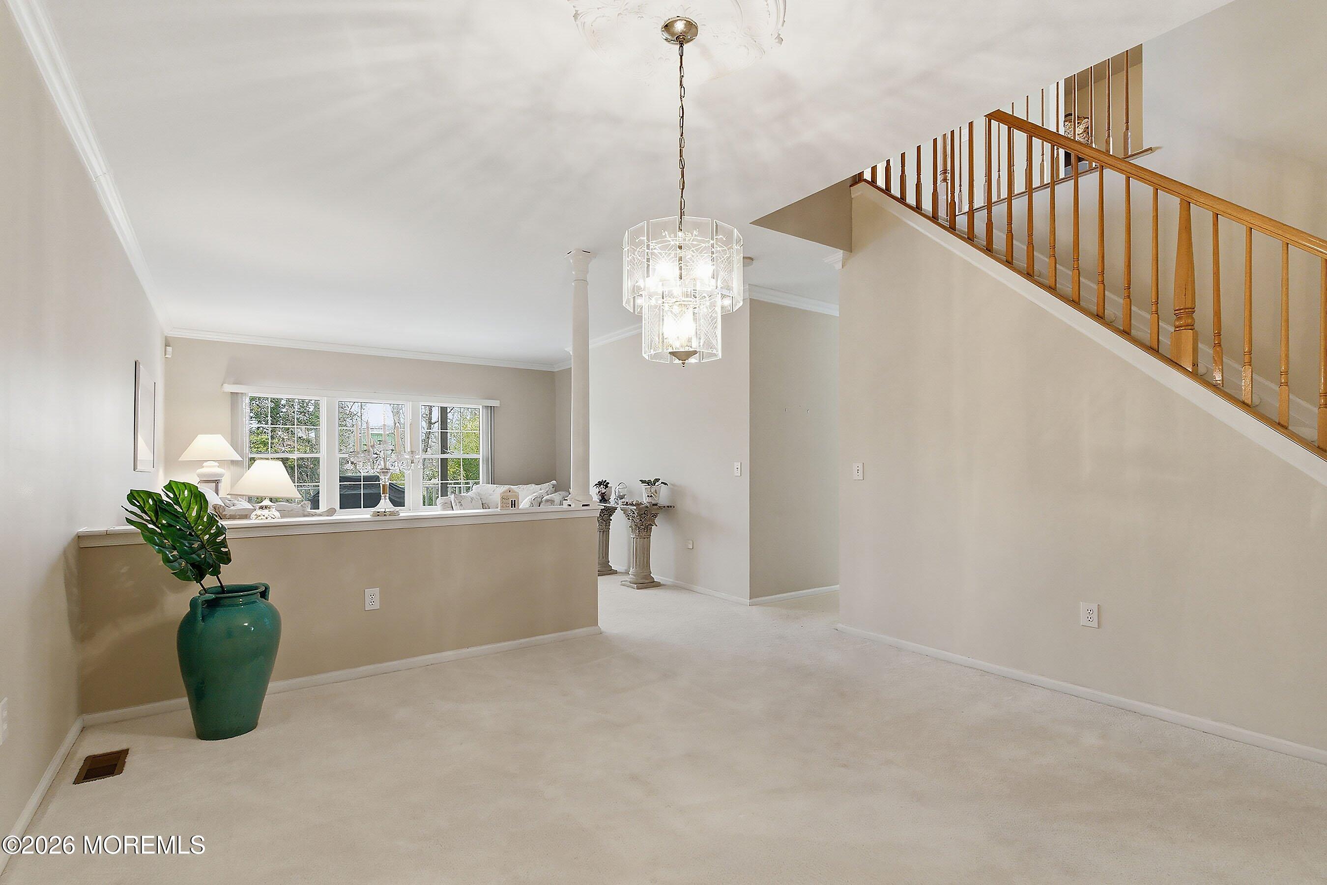 2409 Robin Way Manasquan, NJ 08736 - Photo 9 of 40 a view of a room with window and front door