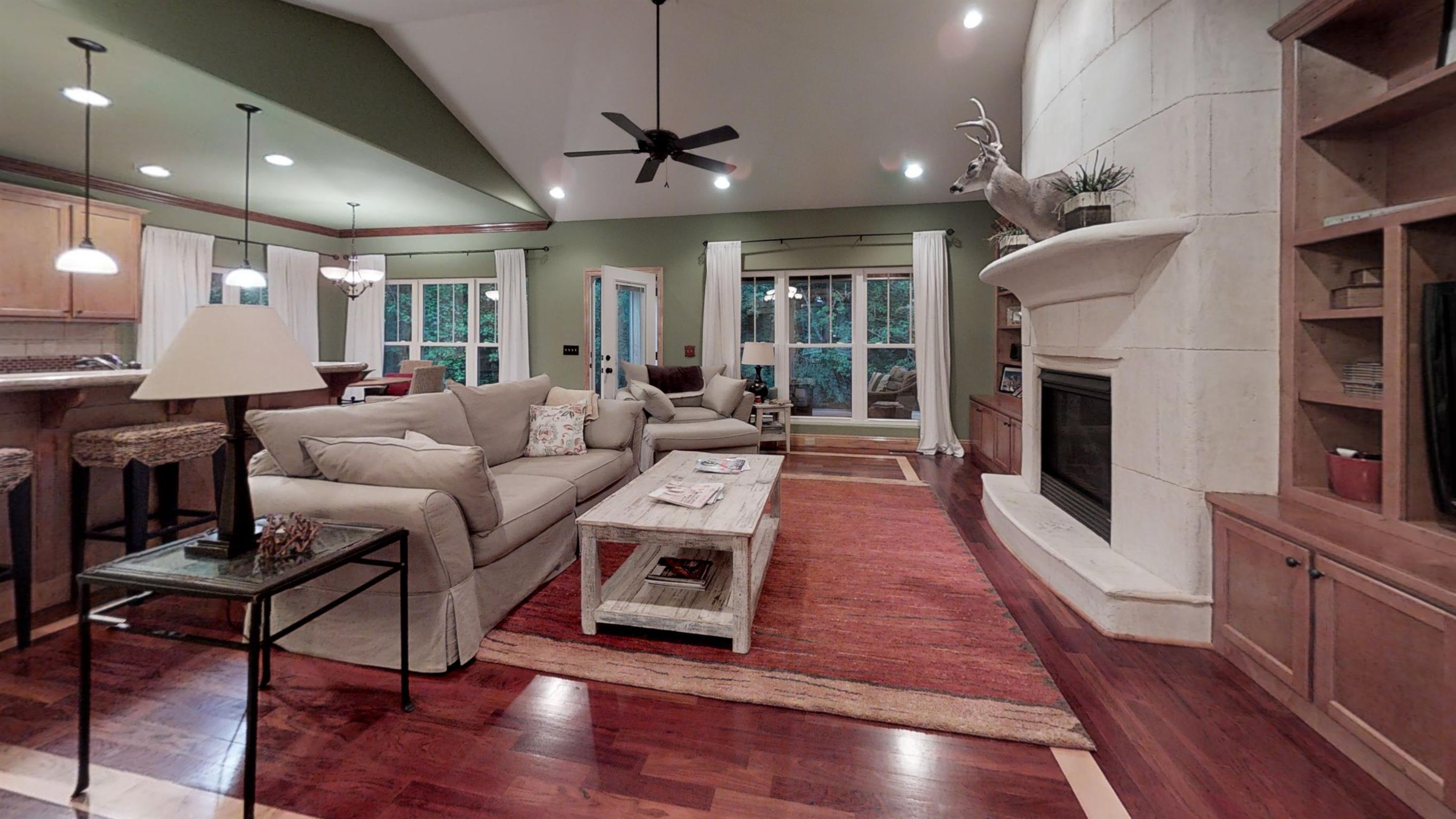 425 Lafever Ridge Road Silver Point, TN 38582 - Photo 3 of 29 a living room with furniture or chandelier and a wooden floor