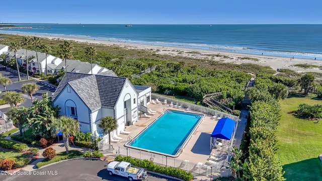 a view of a livingroom with wooden floor and a cabinet
