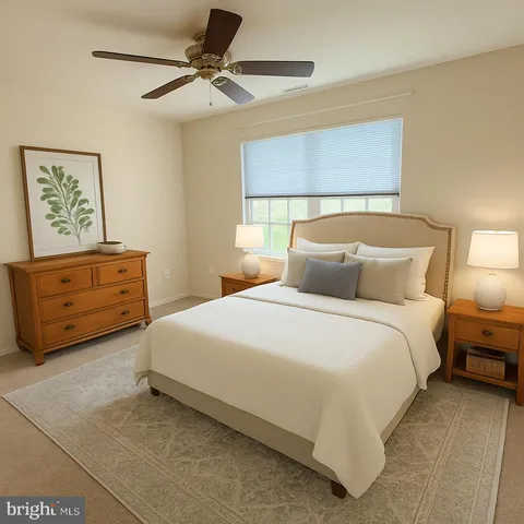 a bedroom with a bed and window