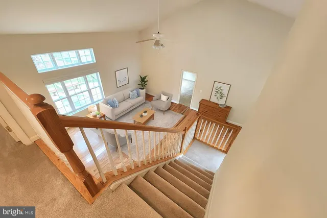a view of living room and workspace